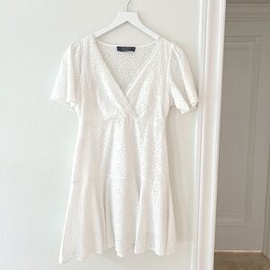 Primark white dress with floral pattern.Size 6.